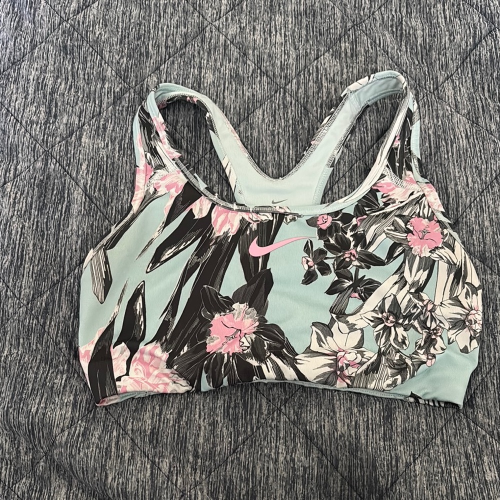 Nike Black and Pink Sports Bra with Racerback Design